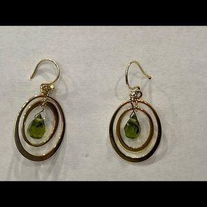 Green and gold hanging earrings.